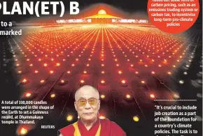  ?? REUTERS ?? A total of 330,000 candles were arranged in the shape of the Earth to set a Guinness record, at Dhammakaya temple in Thailand.
40+
Countries have so far rolled out some form of carbon pricing, such as an emissions trading system or carbon tax, to incentivis­e long-term pro-climate policies