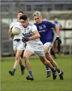  ??  ?? Wicklow’s Cathal Baker drives forward against Longford.