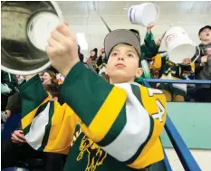  ?? BRANDON HARDER ?? Humboldt Broncos fans show their pride and support during an SJHL playoff game against the Estevan Bruins at home on Tuesday. Humboldt lost to Estevan in overtime and was eliminated.