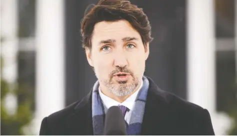  ?? SEAN KILPATRICK / THE CANADIAN PRESS ?? Prime Minister Justin Trudeau addresses Canadians on the COVID-19 situation from his isolation at Rideau Cottage in Ottawa on Tuesday.