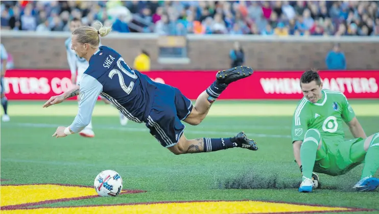  ?? — USA TODAY SPORTS ?? The Whitecaps scored on a penalty kick after Brek Shea was tripped in the first half by Minnesota United goalie Bobby Shuttlewor­th.