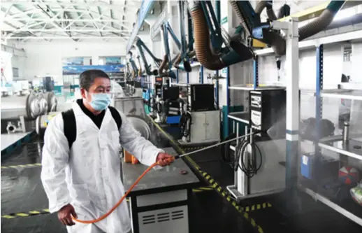  ??  ?? Qingdao Sanli Group’s plant in Shandong Province in east China is being disinfecte­d on February 9
