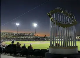  ?? ASSOCIATED PRESS FILE PHOTO ?? A replica of the World Series trophy is seen in the stands as the Washington Nationals play the Houston Astros during a Feb. 27game in West Palm Beach, Fla.