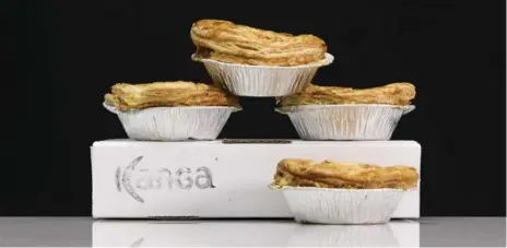  ?? RANDY RISLING/TORONTO STAR ?? Kanga Aussie Meat Pies sells their grab-and-go pies in their three downtown Toronto locations. The pies are about the size of a typical hamburger.