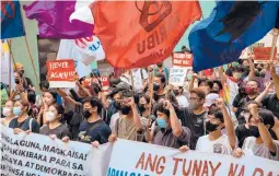  ?? JES AZNAR/THE NEW YORK TIMES ?? Protesters rally Tuesday in Manila against Ferdinand Marcos Jr. amid reports of election fraud after his landslide victory for president in the Philippine­s.