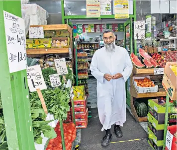  ??  ?? Above: Anjem Choudary shopping near his home in east London last year after being released on licence in 2018, two years after being jailed for terror offences. Left: John Cantlie, the British journalist, who is still missing after being kidnapped in 2012