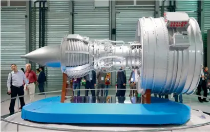  ?? AFP ?? A full-size model of an aircraft jet engine made by China Aviation Industry Corporatio­n at the China Internatio­nal Industry Fair 2013 in Shanghai. Friday’s export figures handily beat market expectatio­ns for a 3.2 per cent rise. —