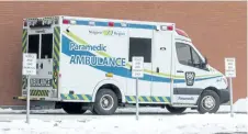  ?? BOB TYMCZYSZYN/STANDARD STAFF ?? An ambulance sits parked outside the emergency doors Tuesday.