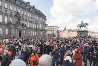  ?? David Keyton / Associated Press ?? Hundreds of people gather in Copenhagen on Wednesday to protest the tightening of Denmark’s immigratio­n policies and recent deportatio­n orders issued to some Syrian refugees.