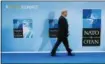  ?? PABLO MARTINEZ MONSIVAIS — THE ASSOCIATED PRESS ?? President Donald Trump walks in as he is introduced at the summit of heads of state and government at NATO headquarte­rs in Brussels on Wednesday.