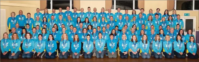  ??  ?? Team Carrie Marathon runners with finishers medals and official T-shirts after the 2018 Dublin Marathon.