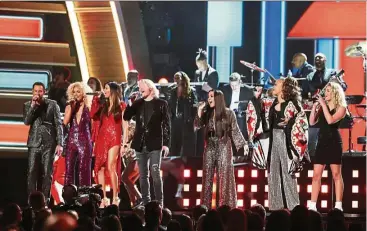  ?? — Reuters ?? (From left) Little Big Town, Demi Lovato, Andra Day and Tori Kelly pay tribute to Bee Gees.