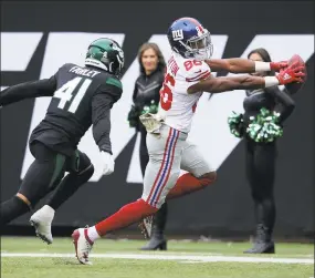  ?? Brad Penner / Associated Press ?? Giants wide receiver Darius Slayton in action against Jets safety Matthias Farley in a Nov. 10 game in East Rutherford, N.J.
