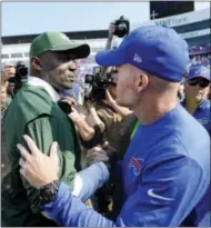  ?? ADRIAN KRAUS — THE ASSOCIATED PRESS FILE ?? In this Sept. 10 photo, New York Jets head coach Todd Bowles, left, and Buffalo Bills head coach Sean McDermott shake hands after an NFL football game, in Orchard Park, N.Y.