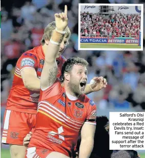 ??  ?? Salford’s Olsi Krasniqi celebrates a Red Devils try. Inset: Fans send out a message of support after the terror attack