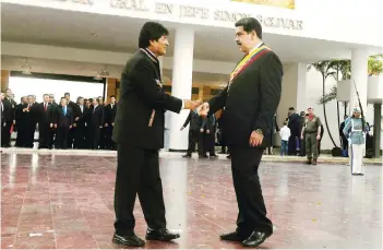  ?? ABI ?? El presidente Evo Morales y el polémico mandatario Nicolás Maduro.