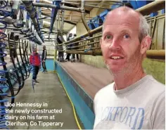  ??  ?? Joe Hennessy in the newly constructe­d dairy on his farm at Clerihan, Co Tipperary