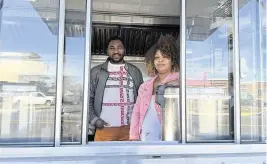  ?? BEN FINLEY AP ?? Theslet Benoir and Clemene Bastien in their Eben-Ezer Haitian food truck in Parksley, Va., on Jan. 24. They are suing the town in federal court, alleging official harassment.