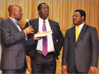  ??  ?? L-R: Chief Wole Olanikpeku­n, SAN, Dr. Wale Babalakin, SAN and the Celebrant, Pastor Dele Adesina, SAN