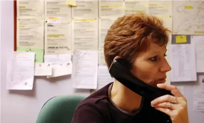  ??  ?? A Women’s Aid counsellor answers a call to the charity’s helpline. Photograph: Linda Nylind/The Guardian