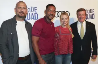  ?? RICHARD LAUTENS/TORONTO STAR ?? From left, Suicide Squad director David Ayer with actors Will Smith, Margot Robbie and Toronto Mayor John Tory.