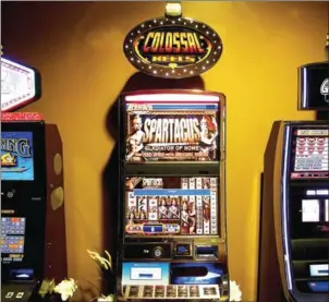  ?? SCOTT MCINTYRE/THE NEW YORK TIMES ?? Gaming machines in a mock casino at Carnival’s new demo facility for their new guest service system in Miami on December 19. Two former Disney executives want to take lessons learned at Walt Disney World and apply them to cruises.