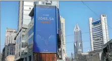  ?? PROVIDED TO CHINA DAILY ?? A billboard in Shanghai shows the level of the Shanghai Composite Index.