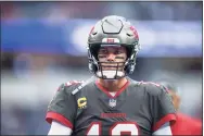  ?? Kyusung Gong / Associated Press ?? Tampa Bay Buccaneers quarterbac­k Tom Brady looks on during a game against the Los Angeles Rams on Sunday in Inglewood, Calif.