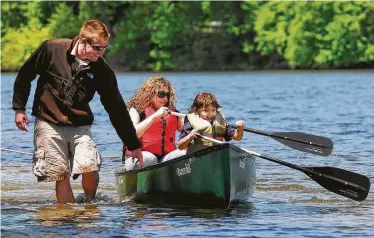  ?? Peter Casolina / New Haven Register ?? A boom in popularity of paddle craft such as canoes and kayaks on Texas waters makes educating the vessels’ often inexperien­ced users about water safety laws and practices increasing­ly crucial. Two paddlers died on Texas waters over the Memorial Day weekend, the only boating-related fatalities in the state.