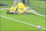  ??  ?? Scotland keeper David Marshall gets entangled in the net trying in vain to save Patrik Schick’s floater that gave Czech a 2-0 win.