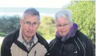  ?? PHOTO: HAMISH MACLEAN ?? Thankful . . . John and Lynette Bates, of Dunedin, were ‘‘just about speechless’’ after they discovered the trees stolen from a picnic spot they had been beautifyin­g at Shag Point had been replaced.