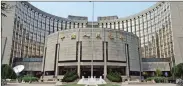  ??  ?? The People’s Bank of China has lowered the one year benchmark bank lending rate by 25 basis points to 4.85%.