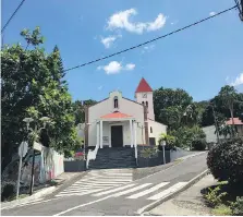  ??  ?? Eglise de Deshaies sits at the centre of the once-isolated small harbour town of Deshaies, which was connected by road just 50 years ago.