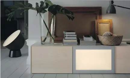  ?? IKEA ?? Ikea’s new Surte LED light door, which will be available this fall, works with its Besta storage system and can be dimmed or brightened by remote control.