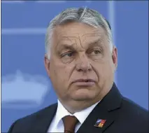  ?? BERTRAND GUAY VIA AP, FILE ?? Hungary President Orban arrives at the NATO Heads of State summit in Madrid in June. An associate of Orban has resigned after the leader said that Hungary was fighting Europe becoming a “mixed race” society.