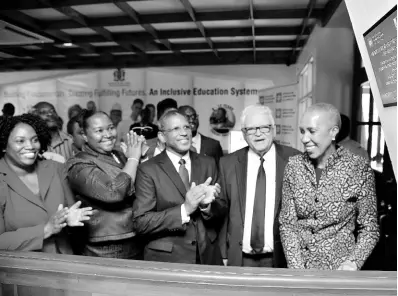  ?? CONTRIBUTE­D ?? Minister of Science, Energy and Technology Fayval Williams (far right) unveils a commemorat­ive plaque for the energy-efficiency interventi­on projects that were carried out by the Petroleum Corporatio­n of Jamaica (PCJ) through its Energy Efficiency and Conservati­on Programme (EECP) at the Ministry of Education, Youth and Informatio­n’s corporate offices in Kingston. The plaque, which was erected at the entrance of the ministry’s lobby, was unveiled in the presence of (from left) Jody Grizzle, project manager, EECP; Dr Grace McLean, permanent secretary; Robert Clarke, acting group general manager, PCJ; and Karl Samuda, minister without portfolio in the education ministry. The project was officially handed over at a ceremony that was held at the ministry on Tuesday.