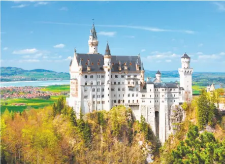  ?? Dominic Arizona Bonuccelli / Rick Steves’ Europe ?? It’s easy to see why Neuschwans­tein castle, dramatical­ly situated on a hilltop in the Bavarian countrysid­e, inspired Walt Disney.
