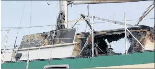  ?? NIKKI SULLIVAN/CAPE BRETON POST ?? The Elonwy was docked at the Ballast Grounds wharf in North Sydney when it caught on fire Saturday night.
