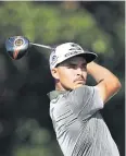  ?? AFP ?? Rickie Fowler tees off at the 13th.