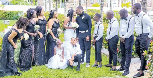  ?? ?? Here’s a classic meets chic look at the bridal party who lean in to support the loving couple on their wedding day.