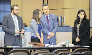  ?? PHOTOS BY ALLEN EYESTONE / THE PALM BEACH POST ?? Attorney Greg Rosenfeld (left), Dalia Dippolito and attorney Brian Claypool stand as Judge Glenn Kelley calls the husband of a juror for questionin­g during jury selection Tuesday at the Palm Beach County Courthouse. The husband was seen talking with...