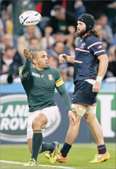  ?? PICTURE: REUTERS ?? HAT-TRICK HERO: Bryan Habana ran in three tries for the Springboks as they beat the US Eagles 64-0 to secure top spot in Pool B at the Rugby World Cup. Habana is now level with Jonah Lomu for most World Cup tries – they each have 15.