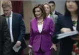  ?? J. SCOTT APPLEWHITE ?? House Speaker Nancy Pelosi, D-Calif., arrives for a closed-door session with her caucus before a vote on a resolution condemning what she called “racist comments” by President Donald Trump at the Capitol in Washington, Tuesday, July 16, 2019. His remarks were directed at Reps. Ilhan Omar of Minnesota, Alexandria Ocasio-Cortez of New York, Ayanna Pressley of Massachuse­tts and Rashida Tlaib of Michigan.