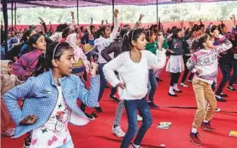  ?? New York Times ?? Women take part in a self-defence training camp. The first move we teach them is how to make a full-throated cry for help when they are attacked, says Renu.