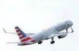  ?? — Reuters ?? An American Airlines Boeing 757 aircraft takes off at the Charles de Gaulle airport in Roissy, France.