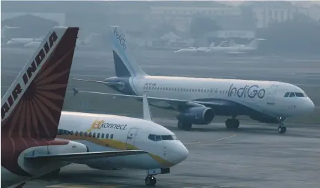  ?? Reuters ?? Air India and IndiGo have been locked in a price war as the companies vie for market share in the crowded Indian skies