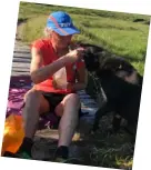  ??  ?? Graham in 2016; (right) a break with her beloved dog Wisp on the Double Ramsay in June