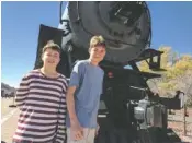  ?? PHOTO BY CHRISTOPHE­R ELLIOTT ?? Aren and Iden Elliott check out a train in Williams, Ariz. America is filled with old trains, hardly any of which run anymore.