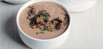  ?? GORAN KOSANOVIC FOR THE WASHINGTON POST ?? Make the broth, pan roast the mushrooms, swirl in some cream — dinner is ready.