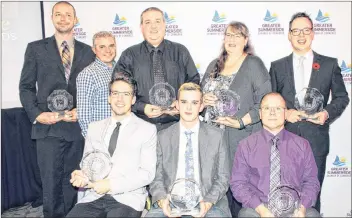  ?? COLIN MACLEAN/JOURNAL PIONEER ?? Winners of the Greater Summerside Chamber of Commerce Business Excellence Awards included, from rear left, Dave Caseley of Warren’s Carpentry, Dave and Duane MacDonald of Callbecks Home Hardware, Sue McGiveron of The College of Piping, Dan Kutcher of South Central Kitchen &amp; Provisions, Sean Aylward of the Humble Barber, Devin Bulger of The Humble Barber and Ken Mister of Holman’s Ice Cream Parlour.